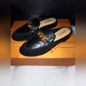 SCHUTZ Black Loafers with Gold Chain Accent